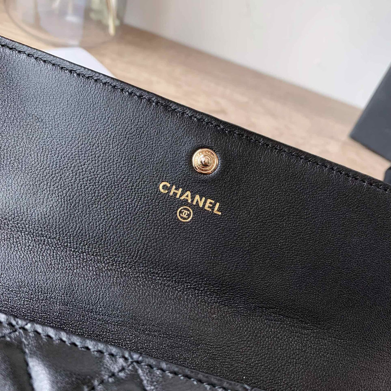 Ch*el boy Ch*el long flap wallet gold tone metal black