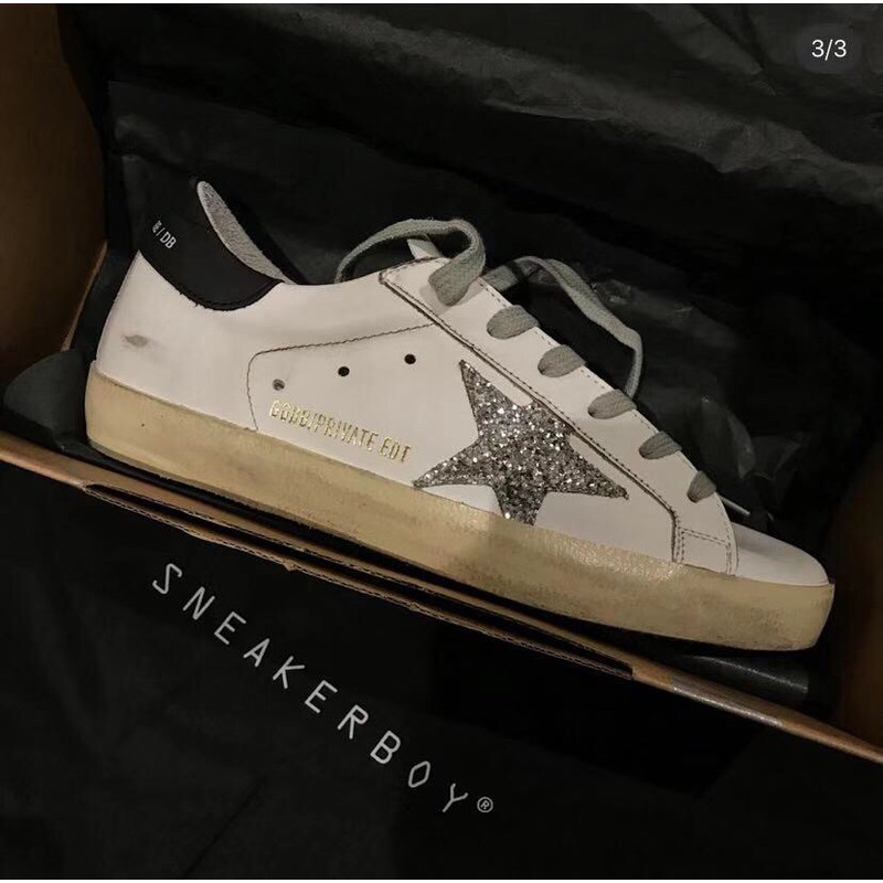 golden goose men’s S*per-star sneakers with silver star and black heel tab