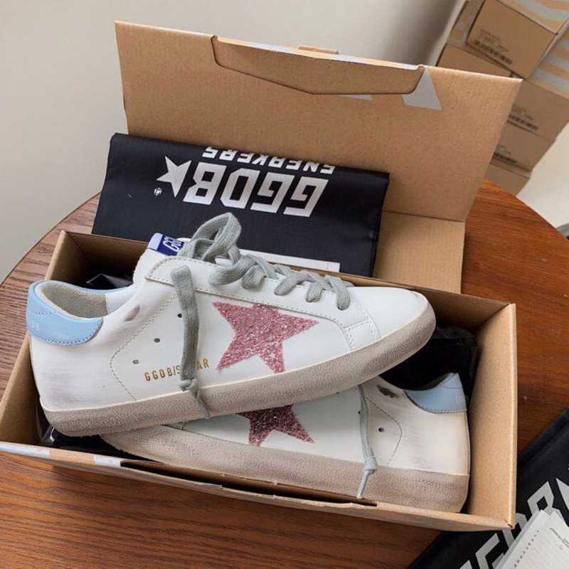 golden goose S*per-star sneakers with pink glitter and blue heel tab