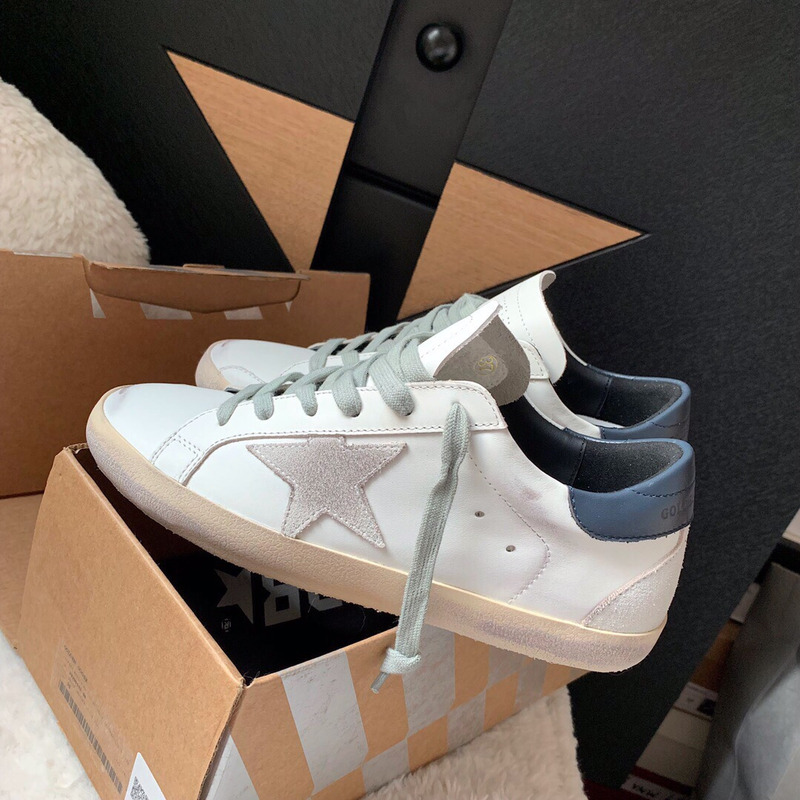 golden goose men’s S*per-star sneakers with suede star and blue heel tab