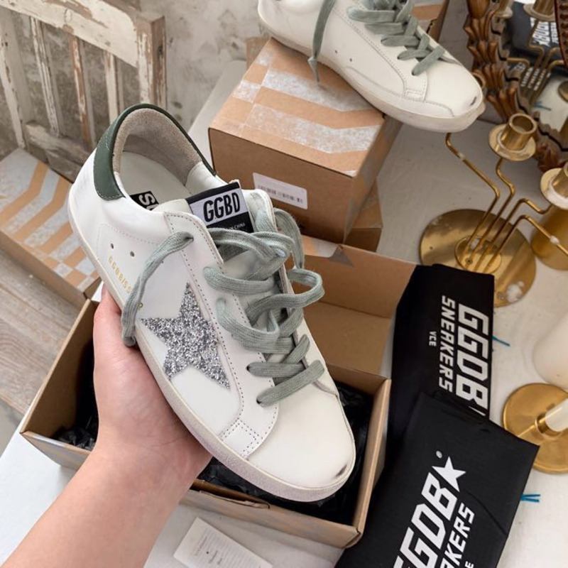 golden goose S*per-star sneakers with sliver glitter and black heel tab