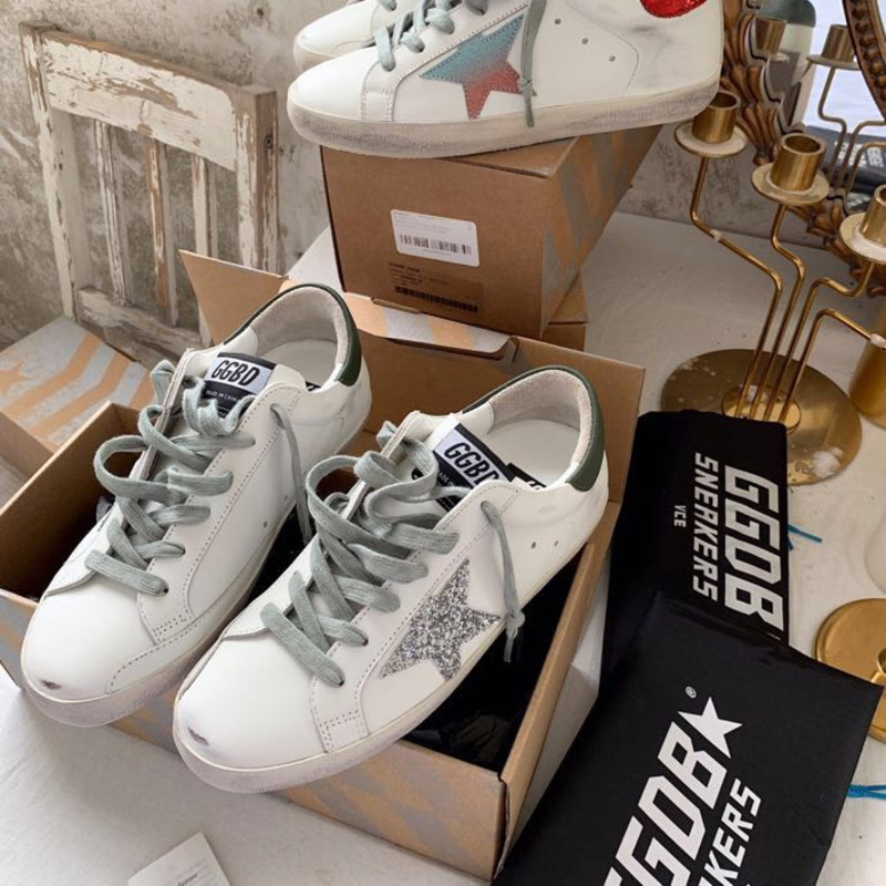 golden goose S*per-star sneakers with sliver glitter and black heel tab