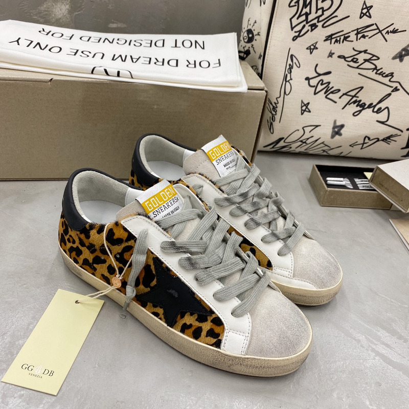 golden goose S*per-star sneakers with leopard print and black heel tab