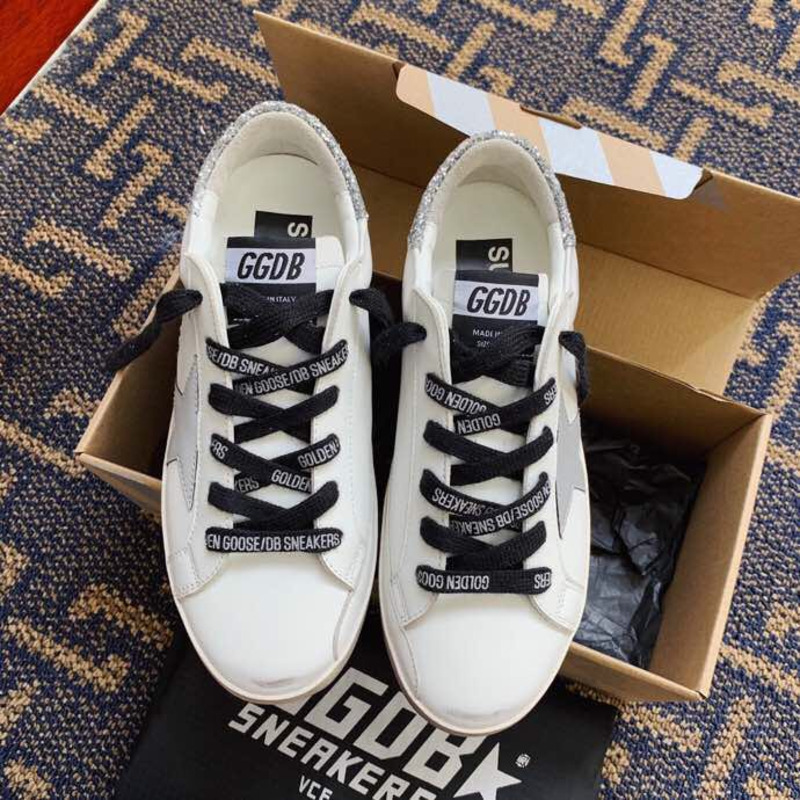 golden goose men’s S*per-star sneakers with suede star and sliver glitterheel tab