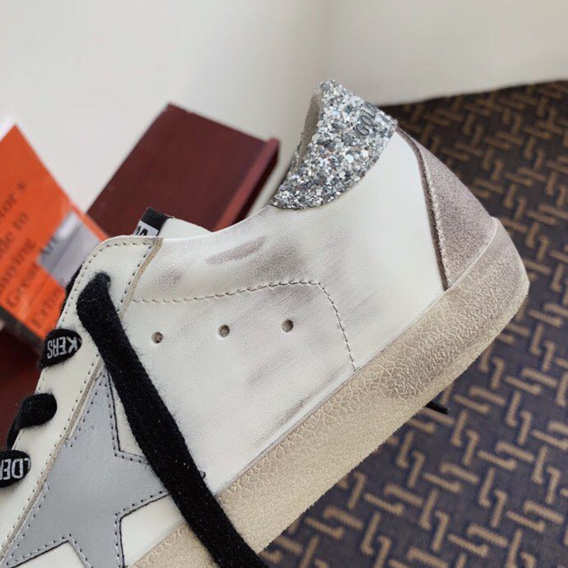 golden goose men’s S*per-star sneakers with suede star and sliver glitterheel tab