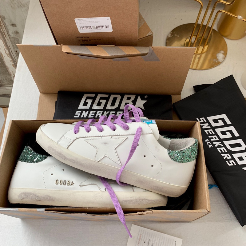 golden goose S*per-star sneakers with star and green glitter heel tab