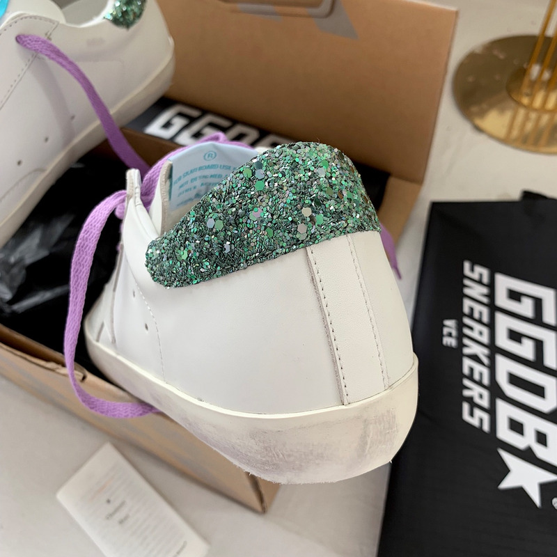 golden goose S*per-star sneakers with star and green glitter heel tab