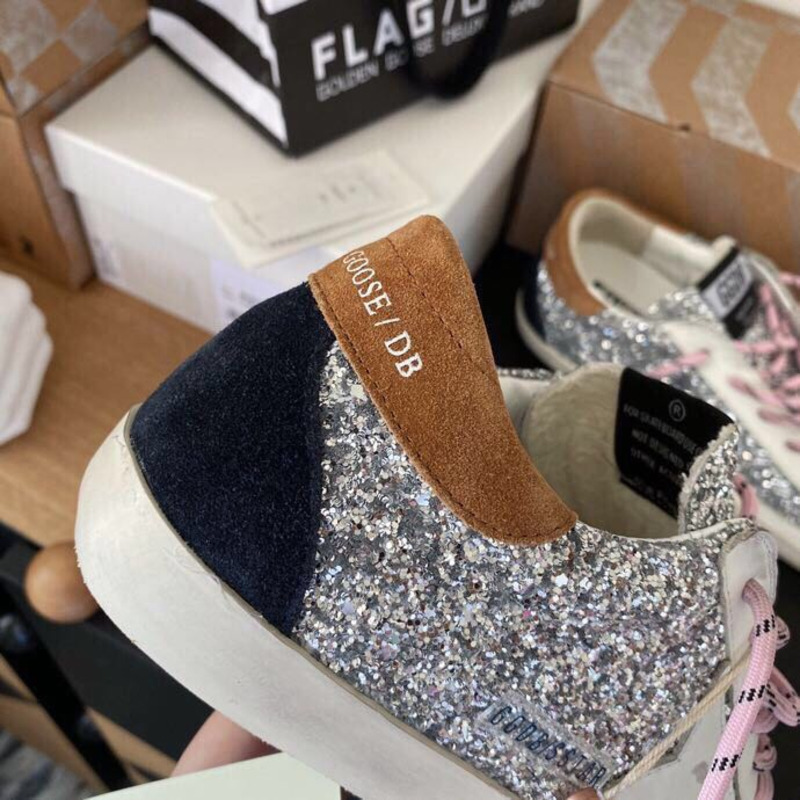 golden goose men’s S*per-star sneakers with sliver glitter and brown heel tab