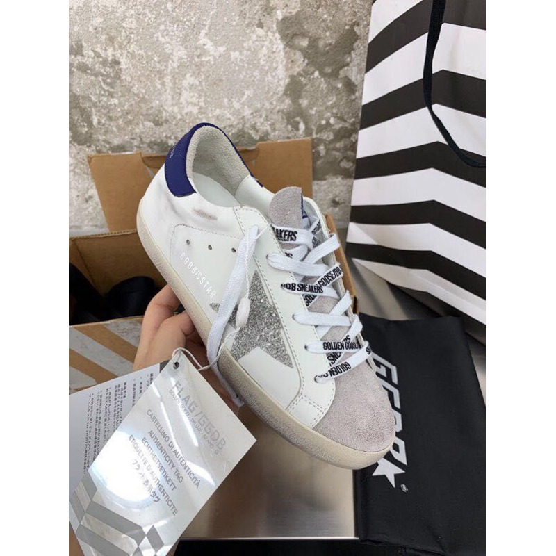 golden goose men’s S*per-star sneakers with sliver glitter star and blue heel tab