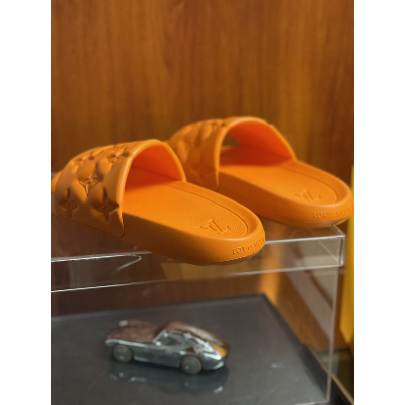 l**is V*t*n’s puffy waterfront mule orange