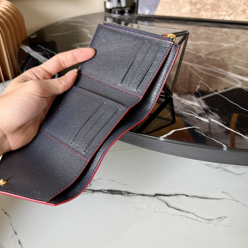 LV Embossed Zoe Short Wallet Leather Blue