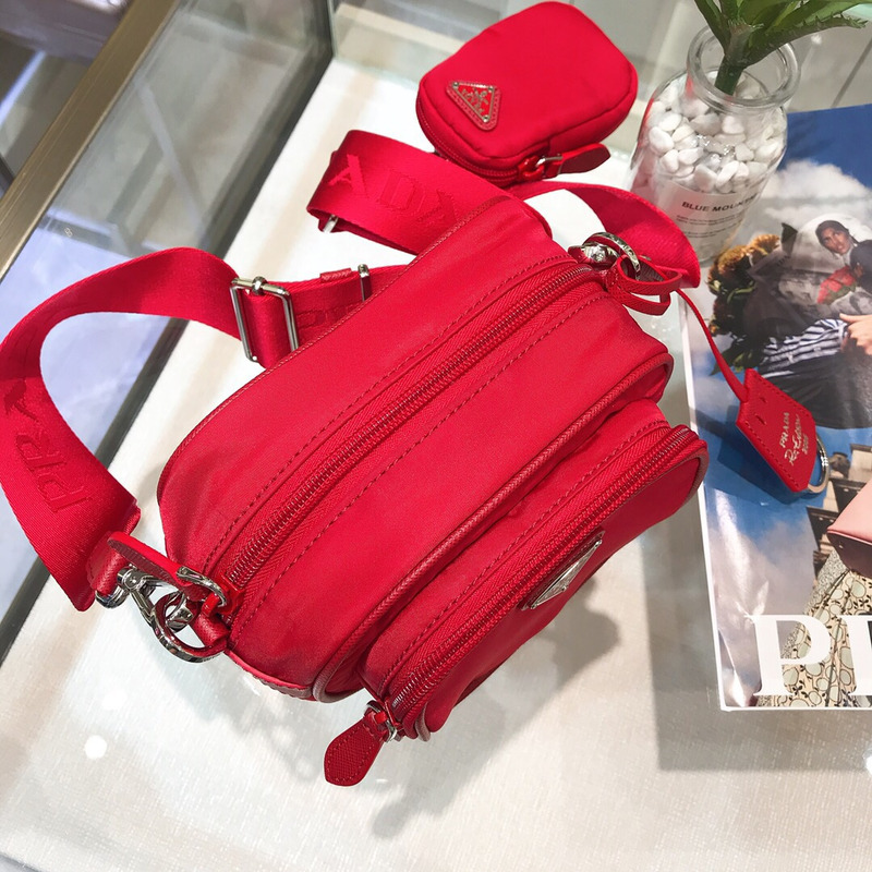 Pra*a saffiano leather mini pouch fiery red