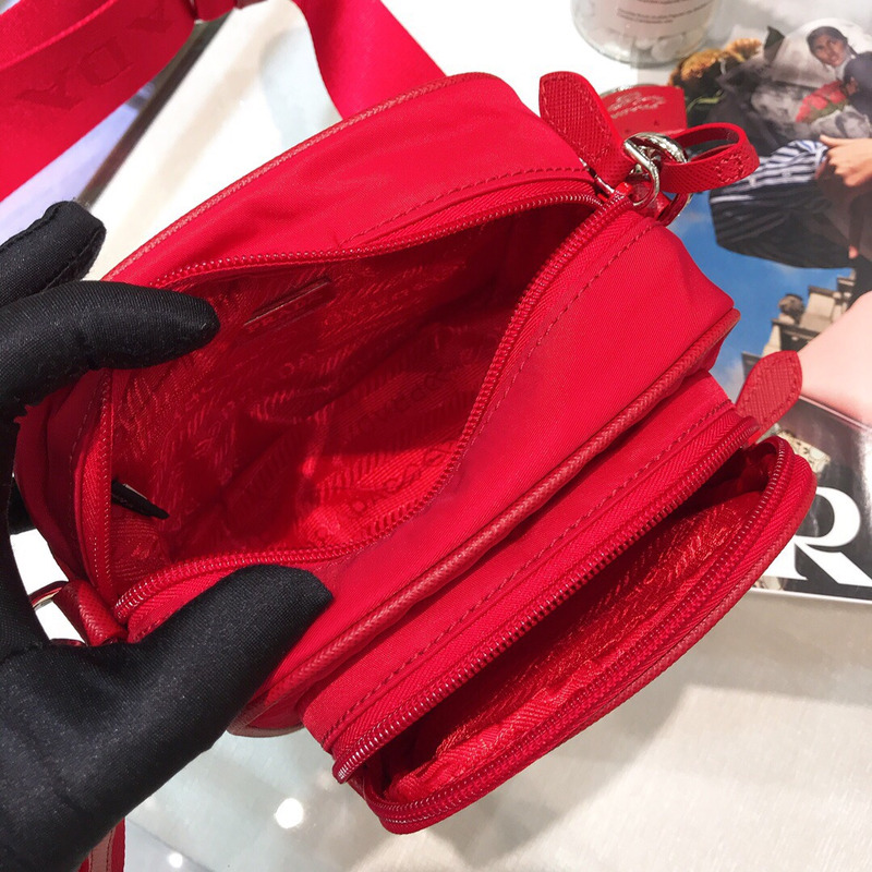 Pra*a saffiano leather mini pouch fiery red