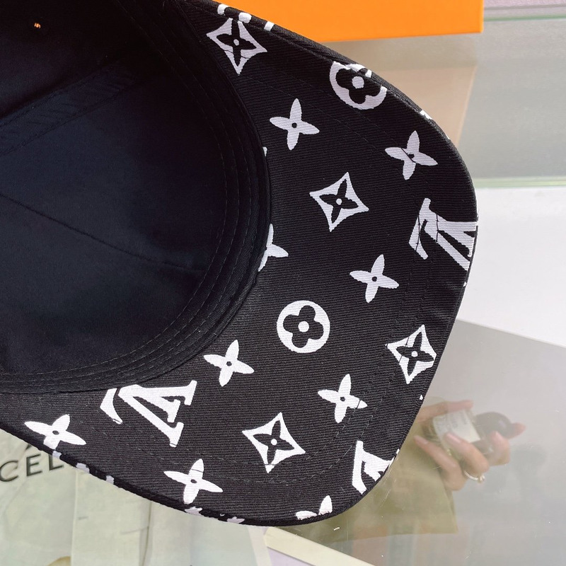 l**is V*t*n embroidered logo hat black