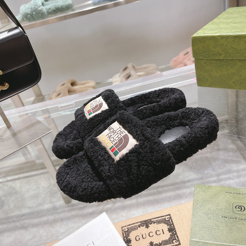 g*u*i x the n0*h F**e shearling slides black