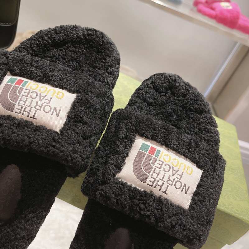 g*u*i x the n0*h F**e shearling slides black