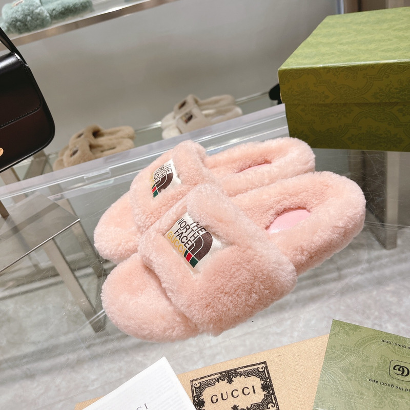 g*u*i x the n0*h F**e shearling slides light pink