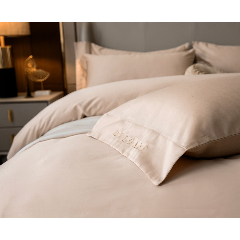 B*l*ai embroidered logo four piece bedding set