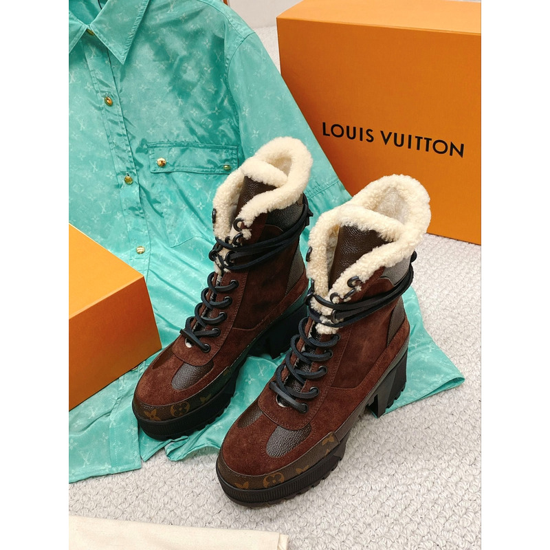 l**is V*t*n laureate monogram platform boots brown