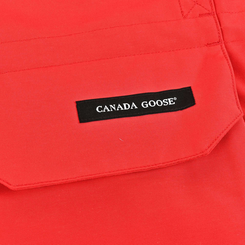 Can*a Go*e expedition parka in red