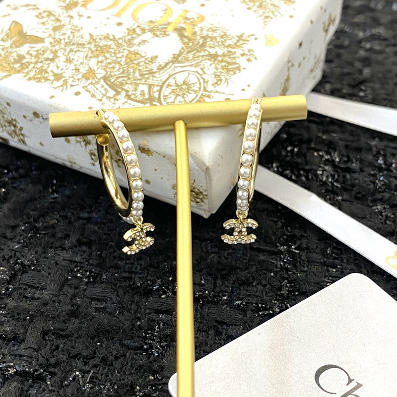 Ch*el pearl stud in rose gold