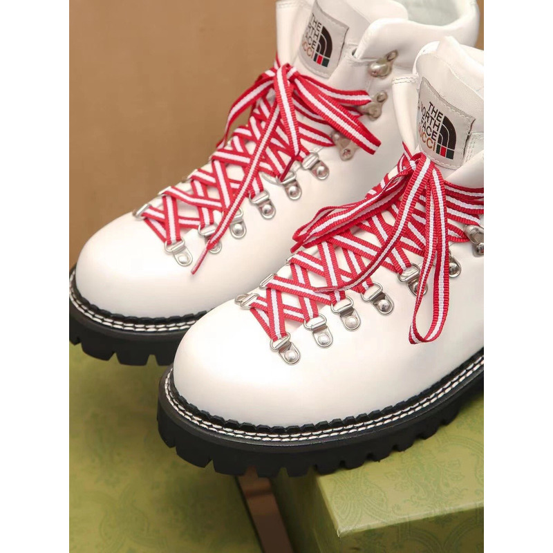 g*u*i x the n0*h F**e leather ankle boots white