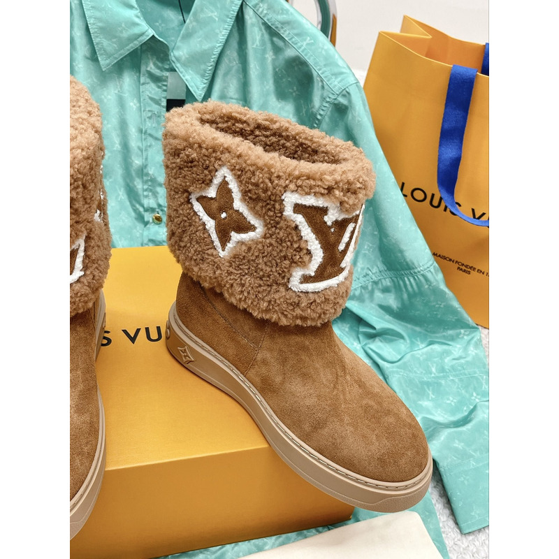 l**is V*t*n snowdrop flat ankle boots cognac
