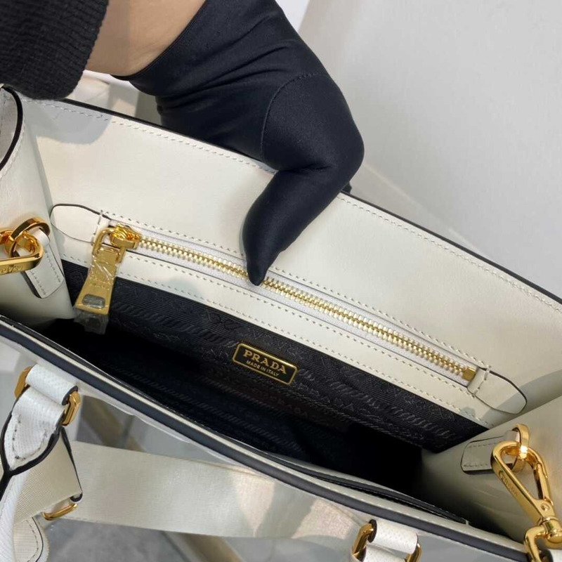 Pra*a medium saffiano leather handbag white