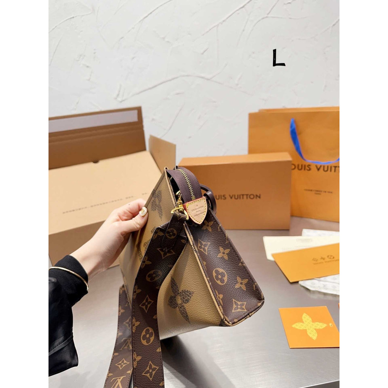 l**is V*t*n toiletry bag with logo