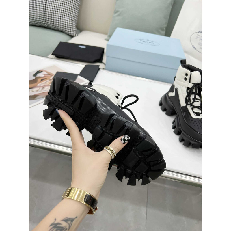 Pra*a cloudbust thunder high top sneakers black and white