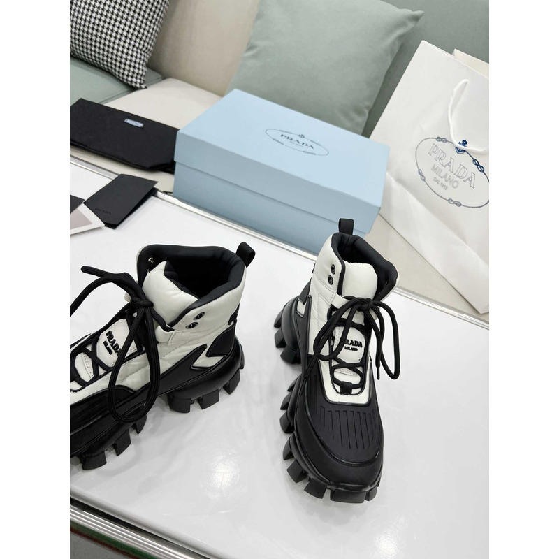 Pra*a cloudbust thunder high top sneakers black and white