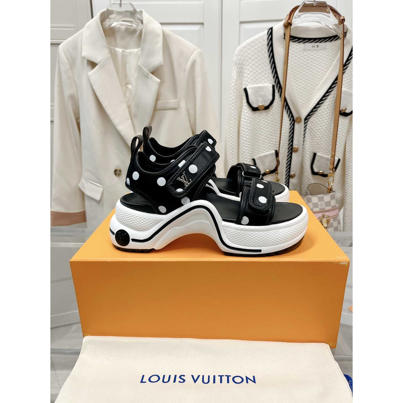 l**is V*t*n archlight sandal black and white