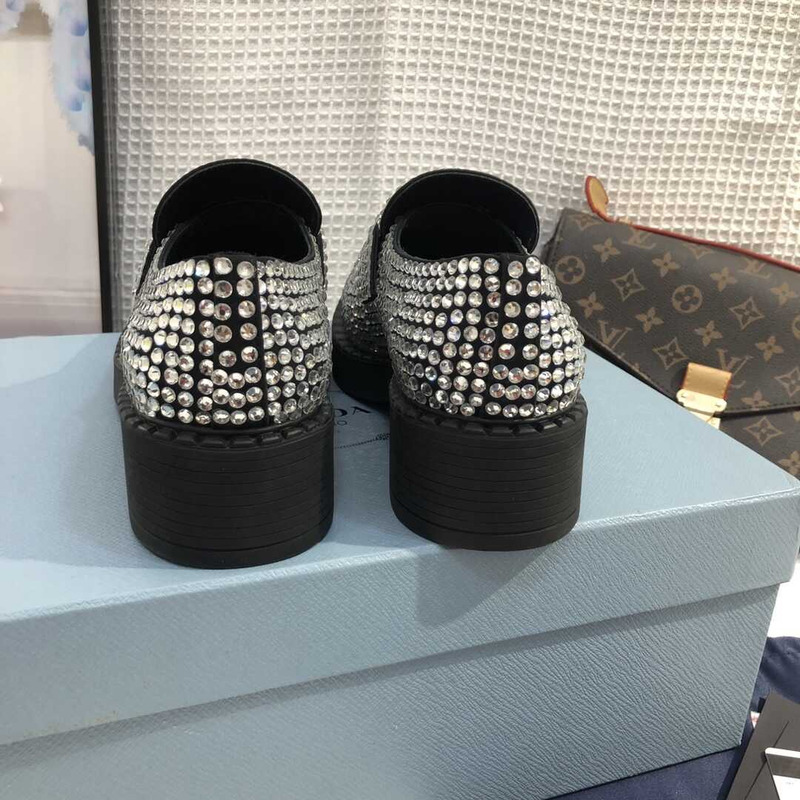 Pra*a crystal-embellished leather loafers