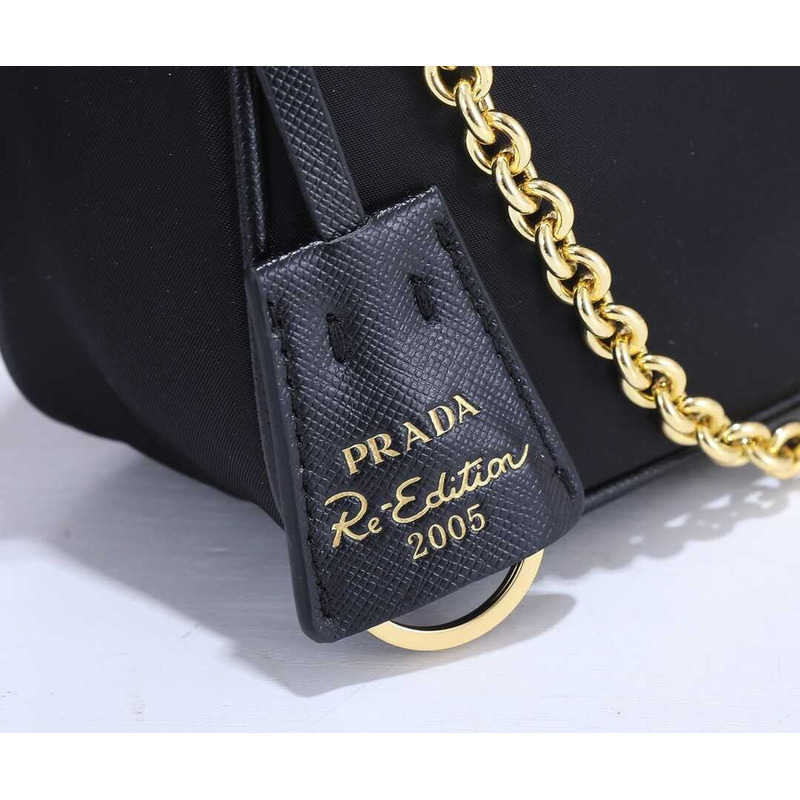 Pra*a black re-nylon bag gold hardware