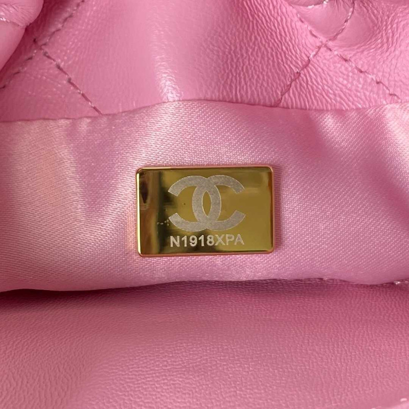 Ch*el small bucket bag lambskin resin & gold-tone metal pink
