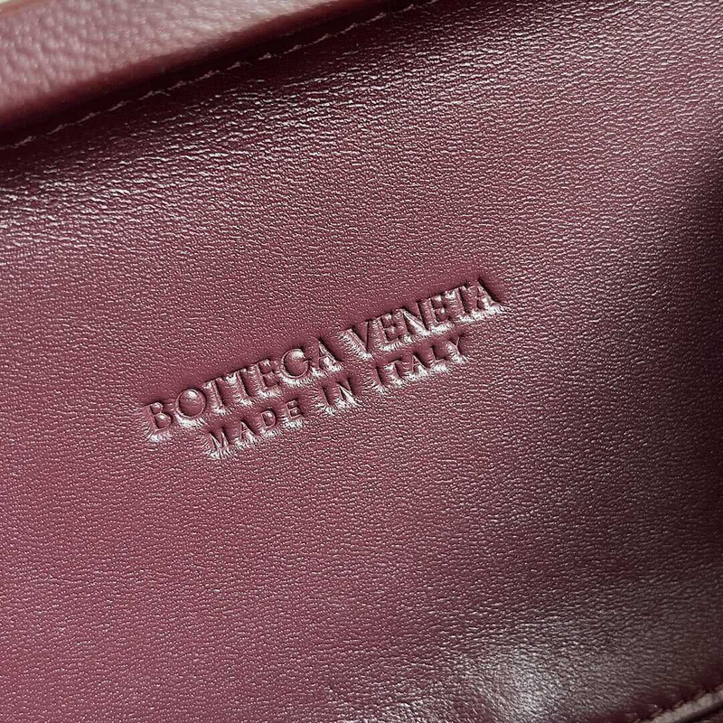 Bo*te*ga ve*ne*ta knot leather clutch dark red