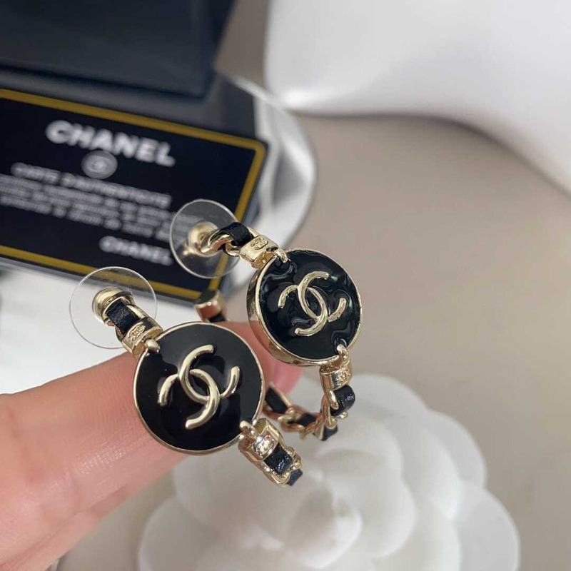 Ch*el metal cc earrings gold and black