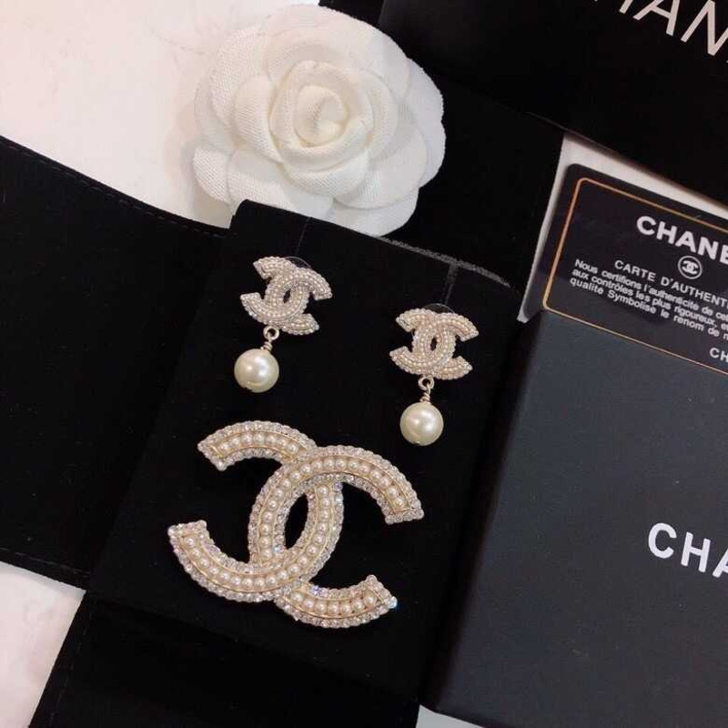 Ch*el crystal and pearl cc earrings