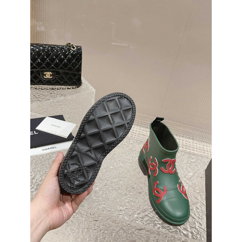 Ch*el short rain boots green and red logo