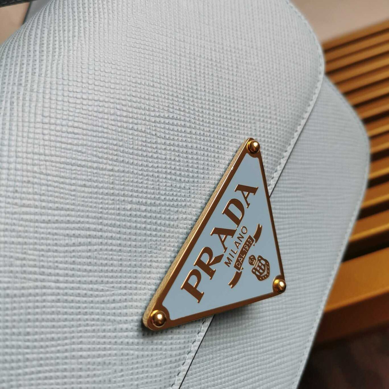 Pra*a emblème leather bag blue