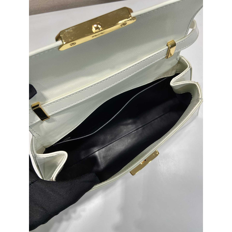Pra*a medium brushed leather handbag white