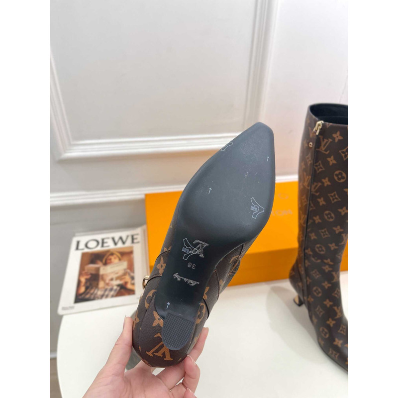 l**is V*t*n ankle boot heels with chain logo monogram