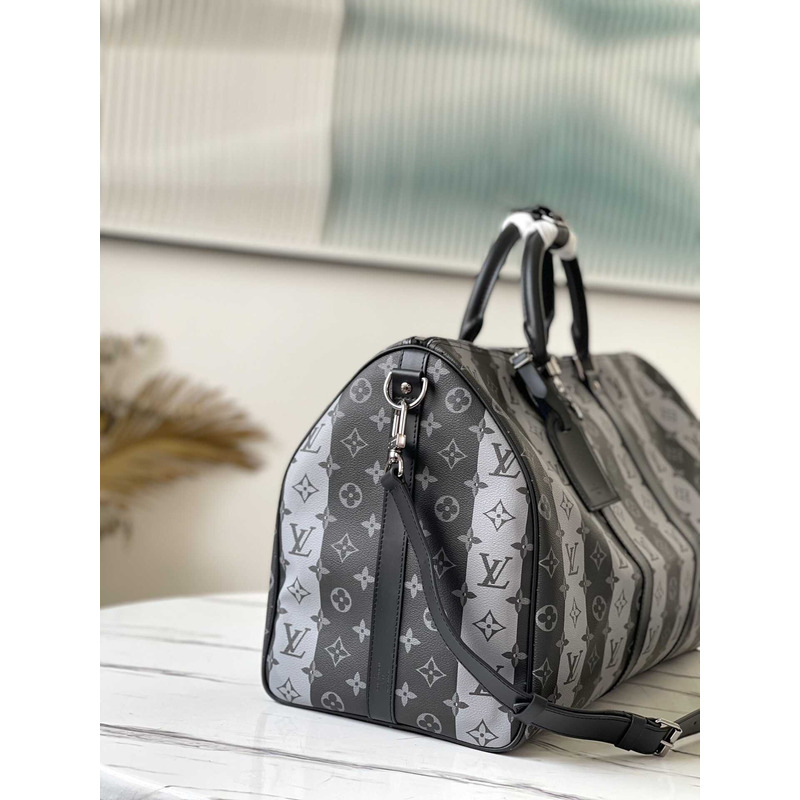 l**is V*t*n keepall bandoulière 50 embossed taurillon monogram cowhide leather bag black and white