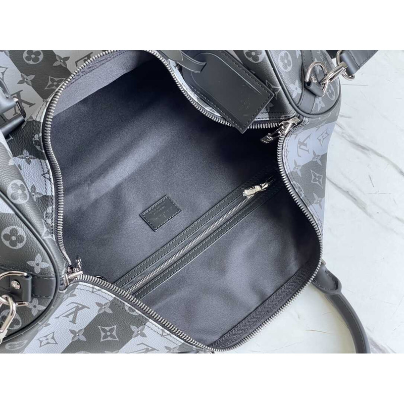 l**is V*t*n keepall bandoulière 50 embossed taurillon monogram cowhide leather bag black and white