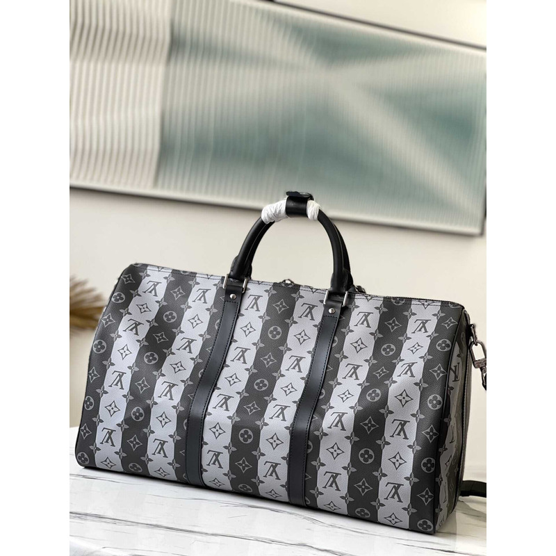 l**is V*t*n keepall bandoulière 50 embossed taurillon monogram cowhide leather bag black and white