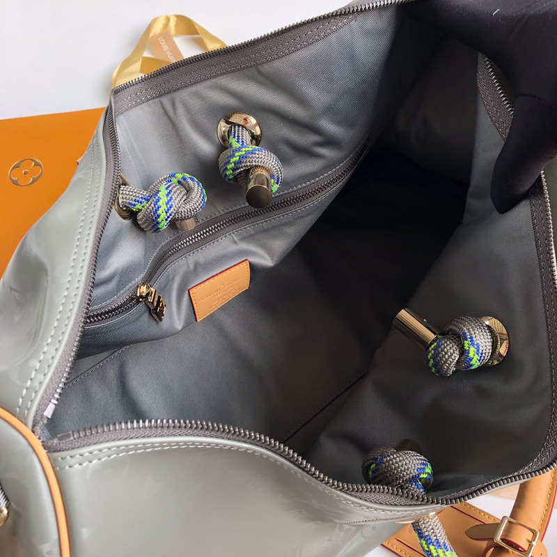 l**is V*t*n keepall bandouliere 50 embossed taurillon monogram cowhide leather bag army green