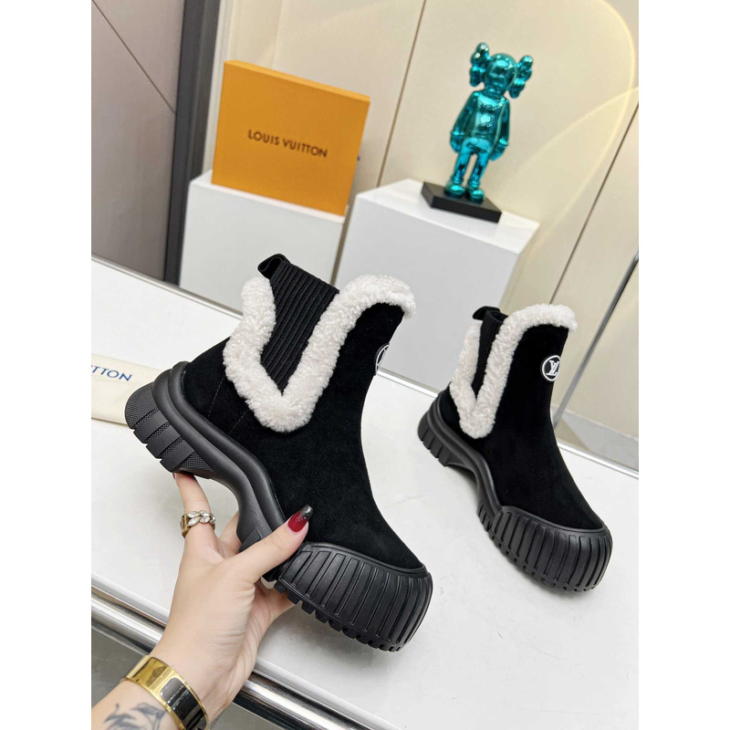 l**is V*t*n ski ruby flat ankle boot black