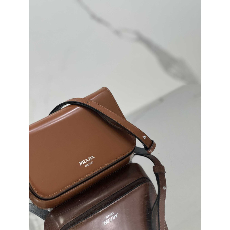 Pra*a brushed leather mini-bag with shoulder strap  brown