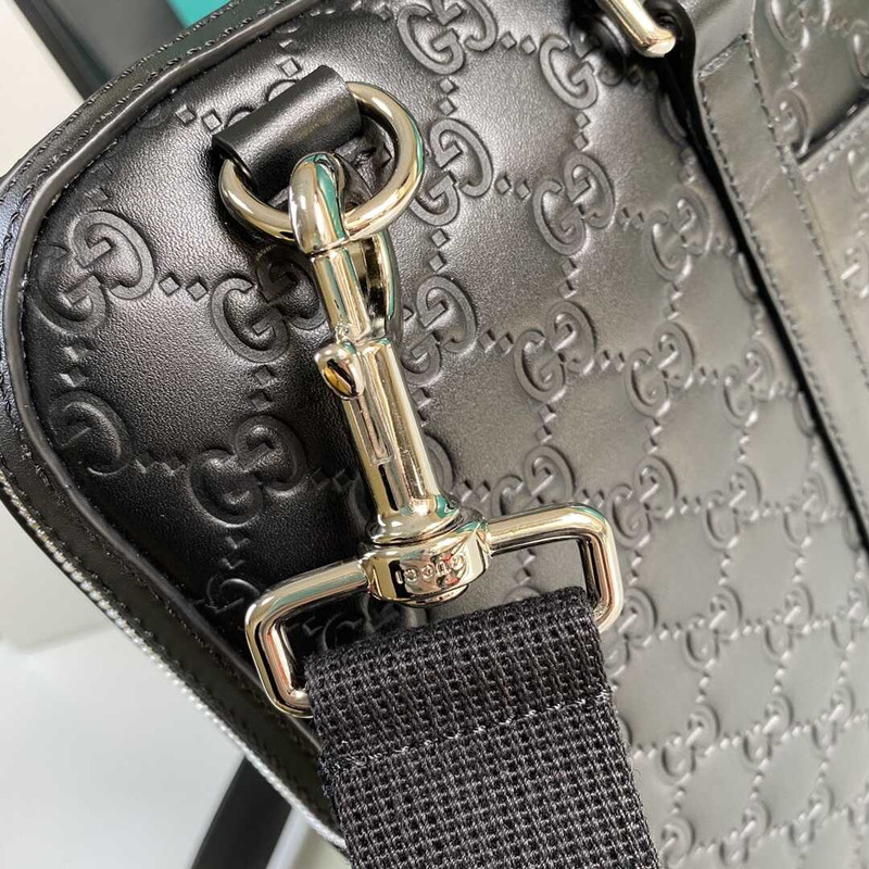 g*u*i gg S*p*e embossed leather briefcase black