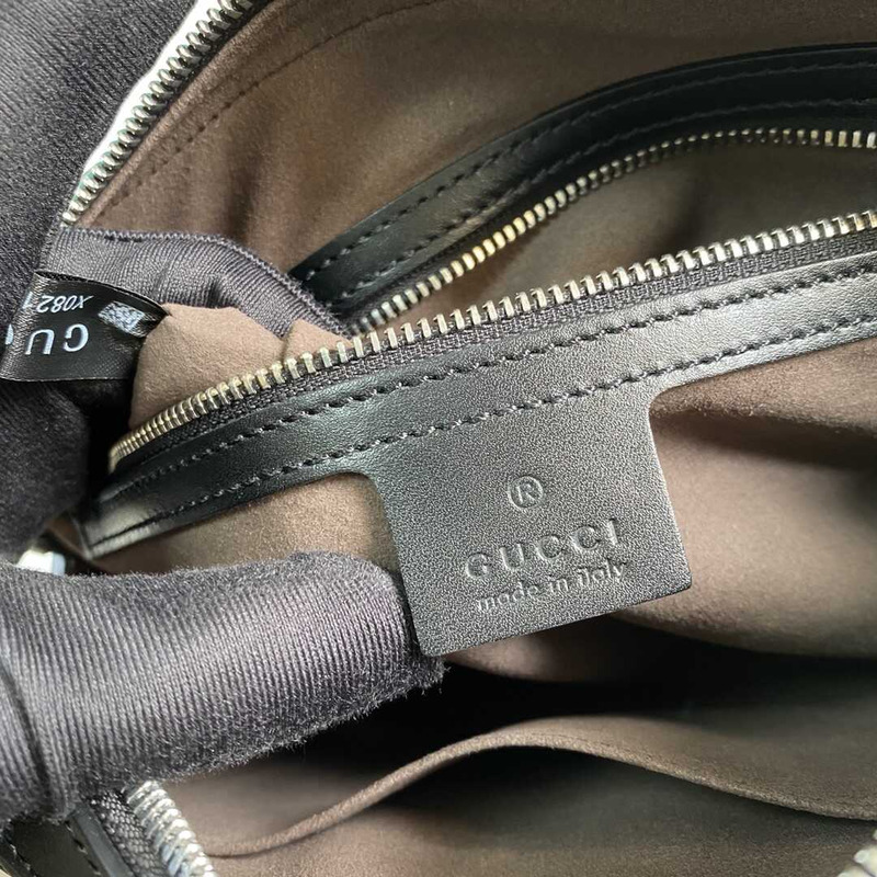 g*u*i gg S*p*e embossed clutch black